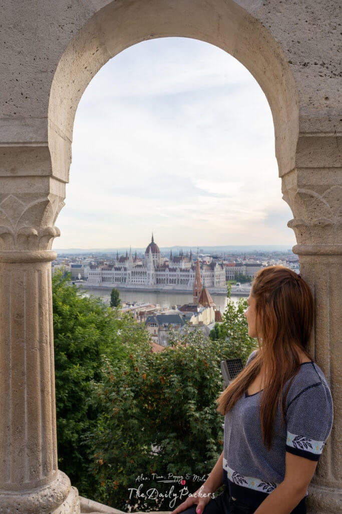 Woman admiring the view of the Hungarian Parliament from Fisherman’s Bastion
