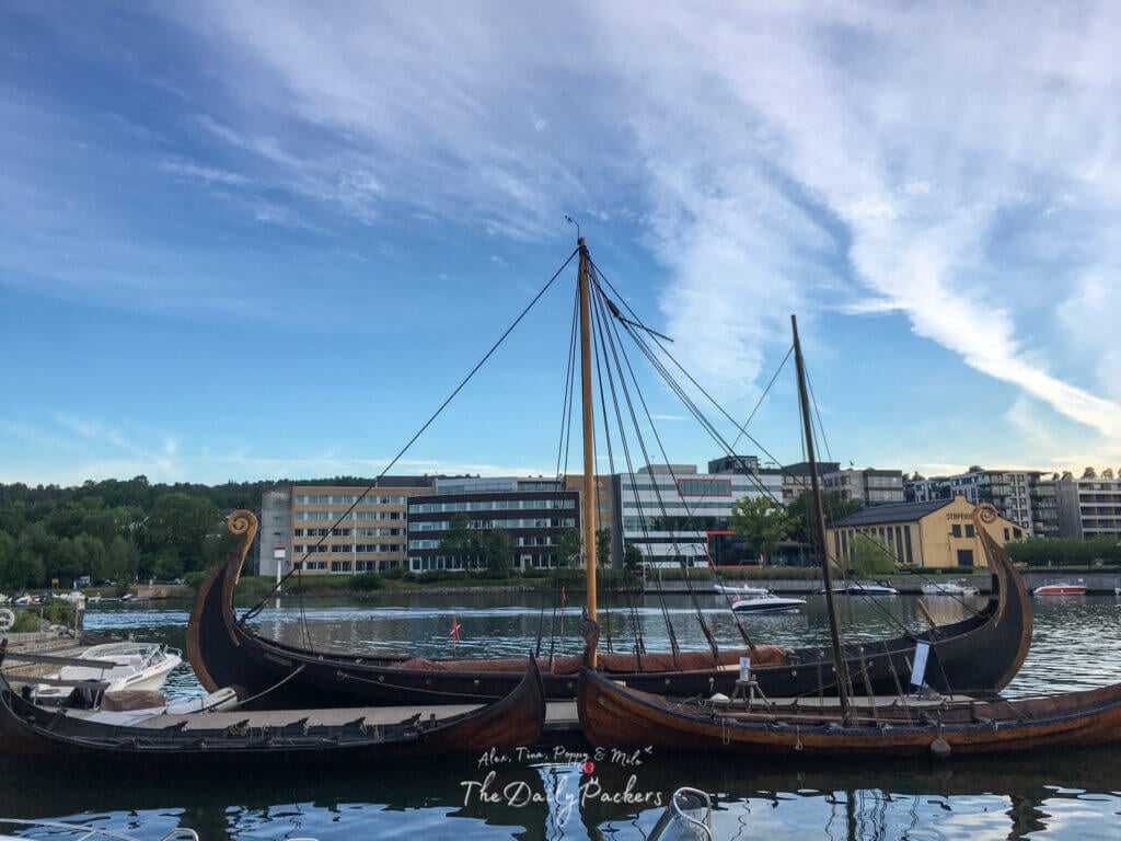 Traditional Viking ships docked in the harbor of Tønsberg’s Brygga.