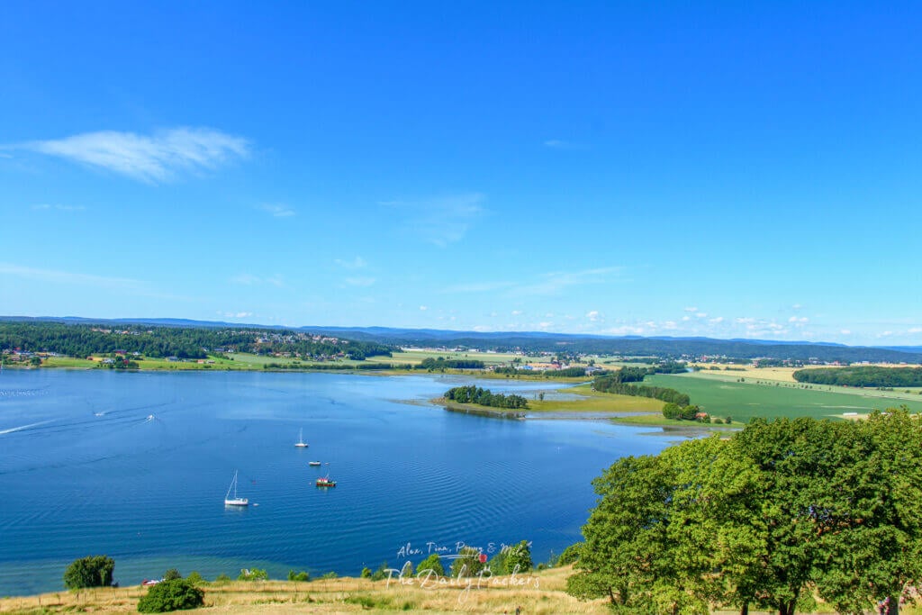 Sweeping view over farmland, forest, and water from the top of Castle Hill in Tønsberg, Norway.