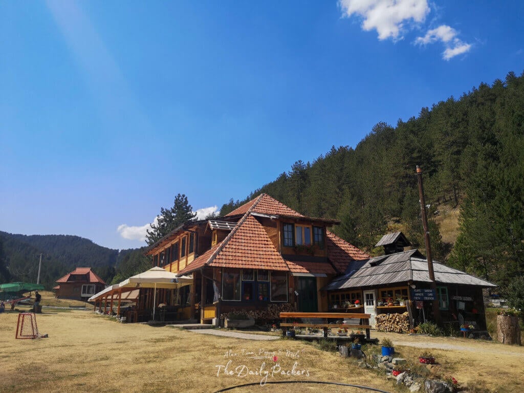Traditional guesthouse in ethno village Boškova Voda surrounded by pine trees