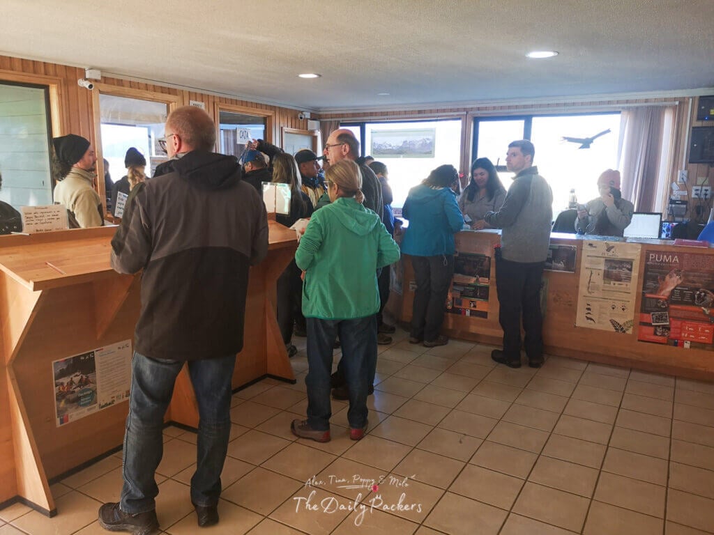 Visitors gathered inside the Torres del Paine entrance office to buy tickets and register.