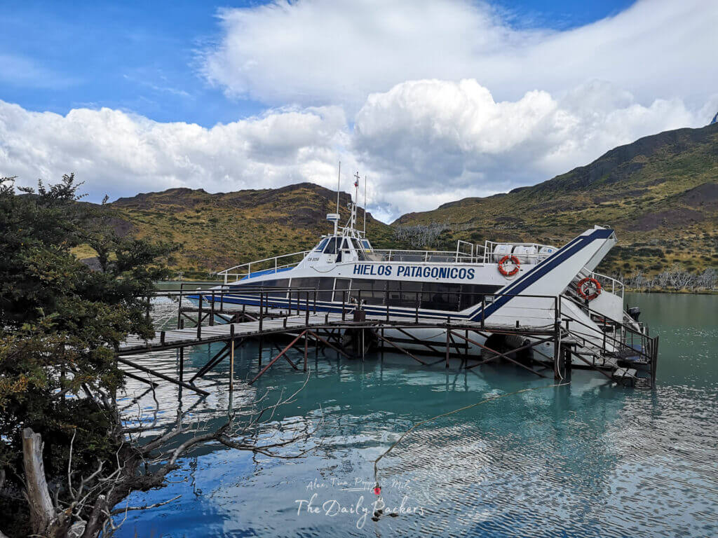Ferry boat “Hielos Patagónicos” docked on the turquoise waters of Lago Pehoé in Torres del Paine National Park, Chile.