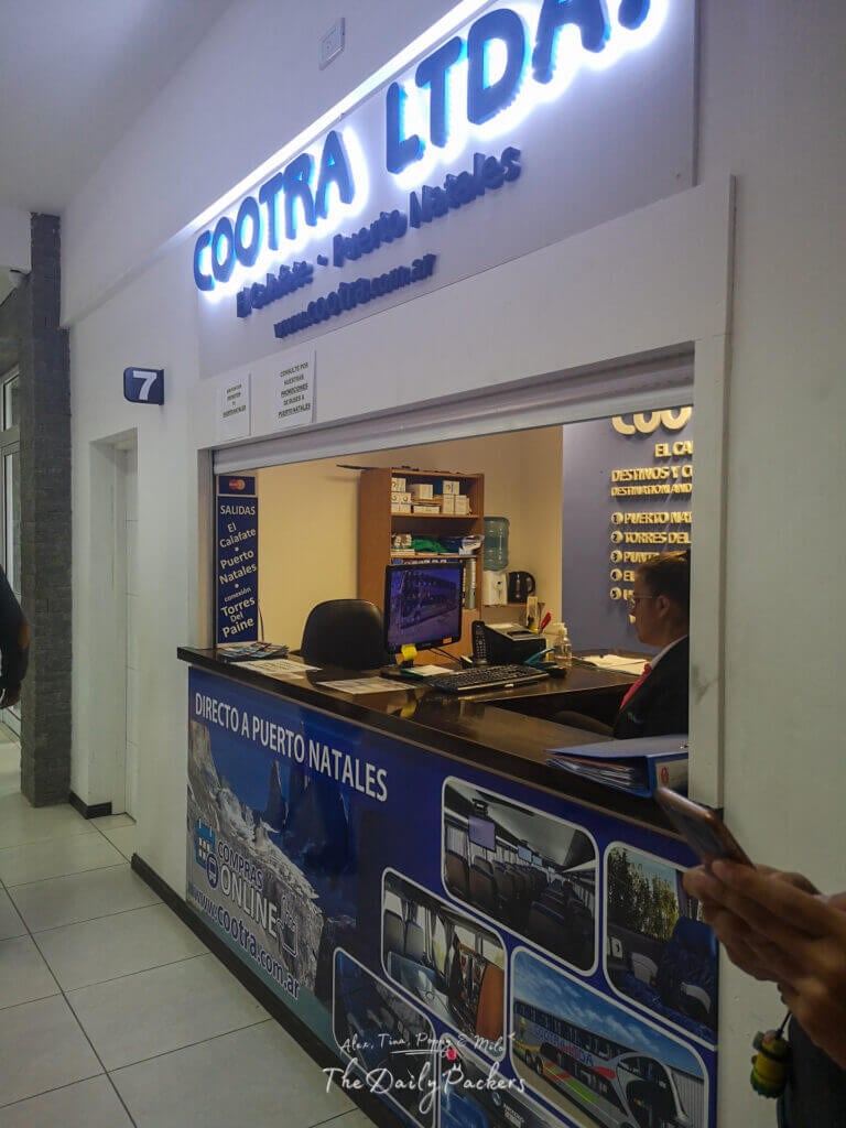 COOTRA LTDA ticket counter at the El Calafate bus terminal advertising routes to Puerto Natales and Torres del Paine.