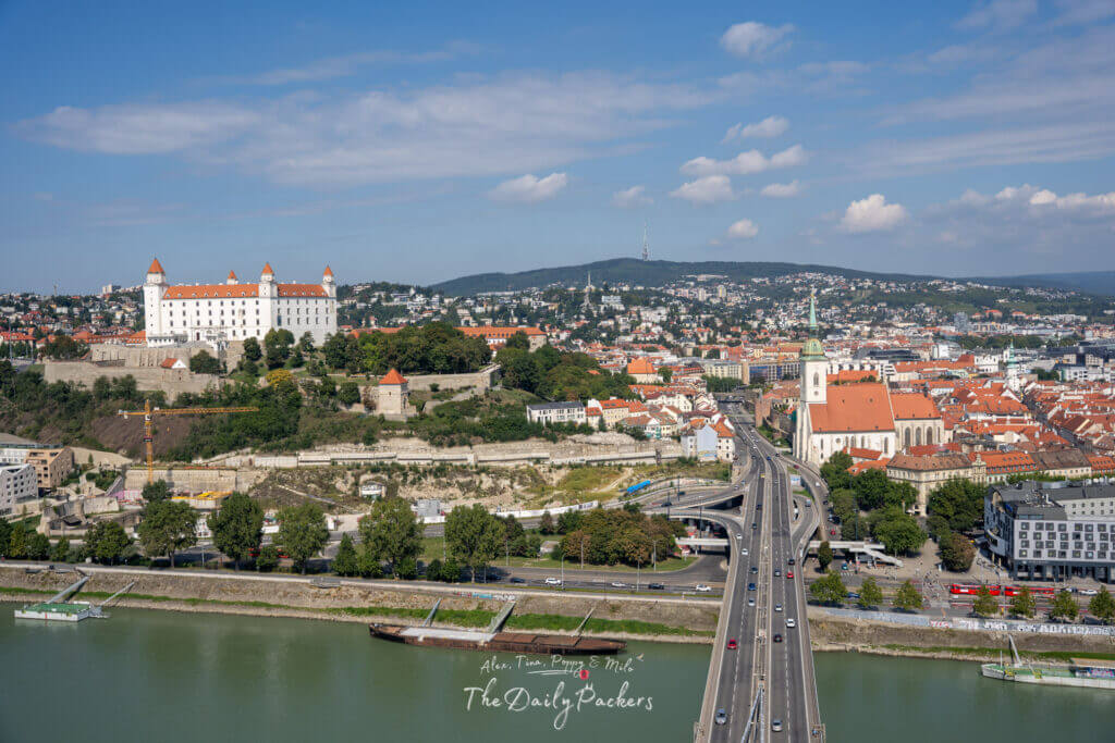 Aerial view of Bratislava Castle, St. Martin’s Cathedral, and the Old Town from the UFO Tower above the Danube River.