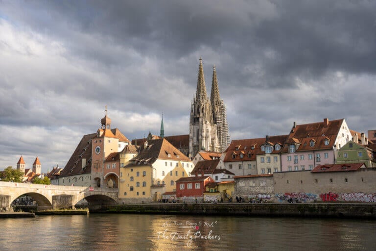 Main panoramic view over Regensburg with the Danube, old bridge, and cathedral towers.