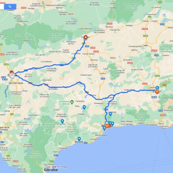 Map of southern Spain showing a detailed road trip route passing through Seville, Córdoba, Granada, and Málaga.