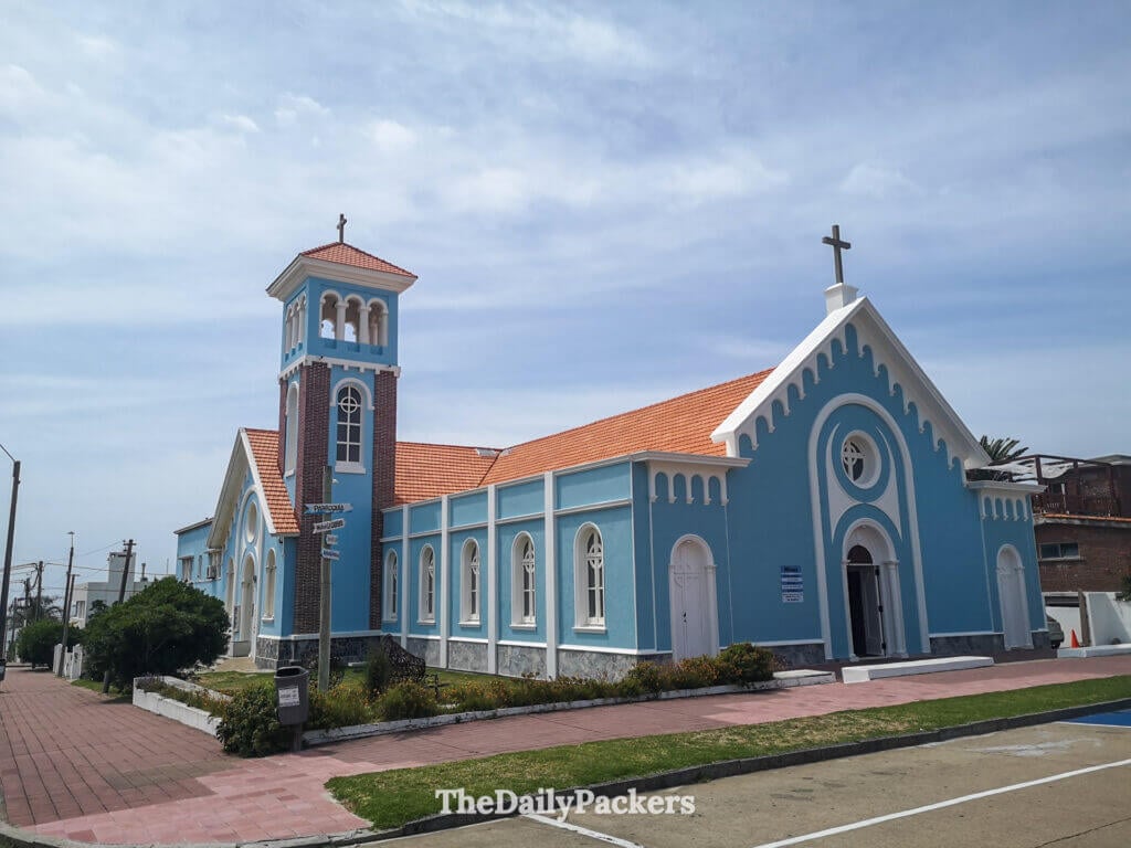 The sky-blue and white facade of Our Lady of the Candelaria Church, a peaceful landmark near Punta del Este’s port.