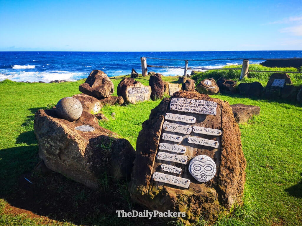 Carved volcanic stone monuments of the Hitú Merahi cultural site displayed beside the ocean, honoring Rapa Nui heritage in Hanga Roa.