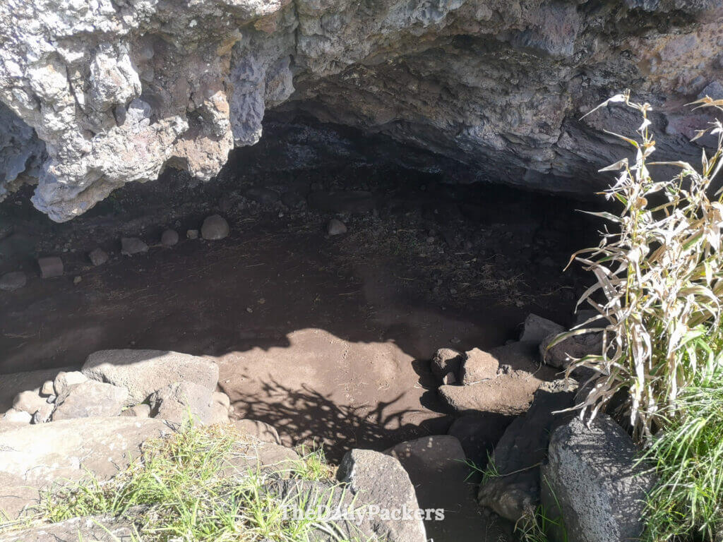 Closer look at the stone foundations and cave of Akahanga, an important ancestral settlement on Easter Island.