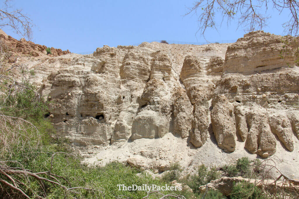 Rocky cliffs and desert vegetation along the Ein Gedi Nature Reserve trail near the Dead Sea
