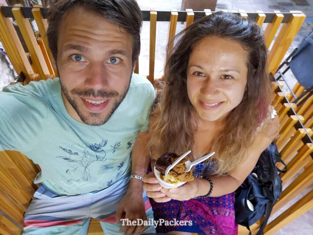 Travelers enjoying ice cream at Rapa Nui in Buenos Aires, capturing a casual moment inside one of the city’s most famous chocolate shops.