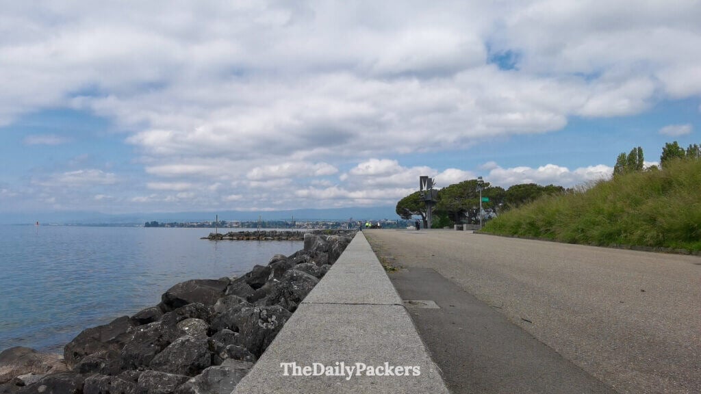 Ouchy lakeside promenade in Lausanne with walking path along Lake Geneva