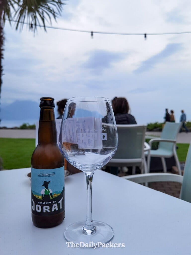 Drinks on a terrace at Voiles de la Rouvenaz in Montreux by Lake Geneva