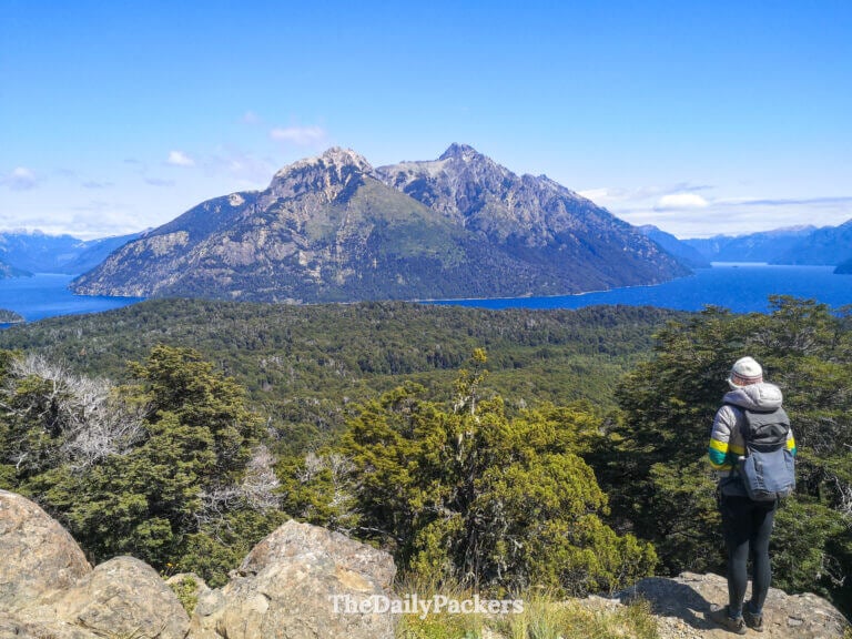 Hiker overlooking lakes and mountains on Circuito Chico, one of the best places to visit in January