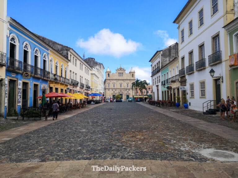 Largo Terreiro de Jesus in Salvador with colorful colonial buildings, cafés, and the historic church anchoring this lively Pelourinho square