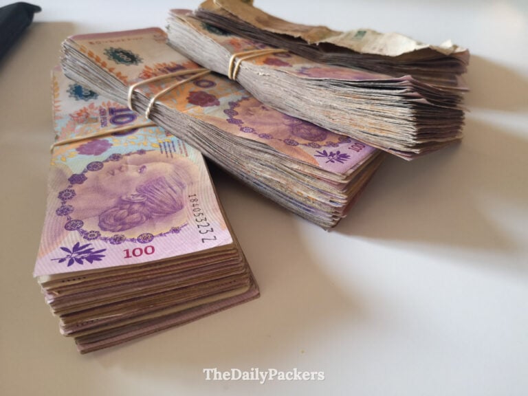 Stack of money in Argentina, peso banknotes used for cash payments