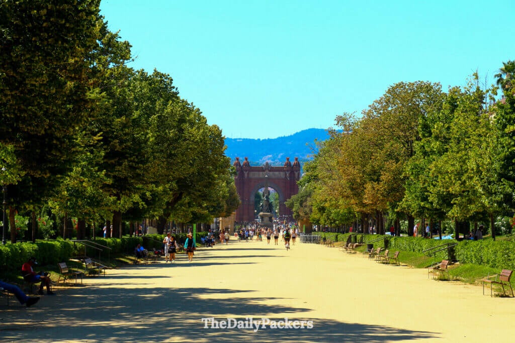 Parc de la Ciutadella walkway leading to Arc de Triomf on a sunny day in Barcelona