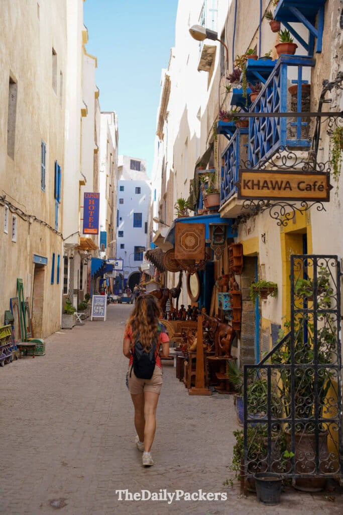 Medina street in Essaouira with shops, balconies and traditional Moroccan details