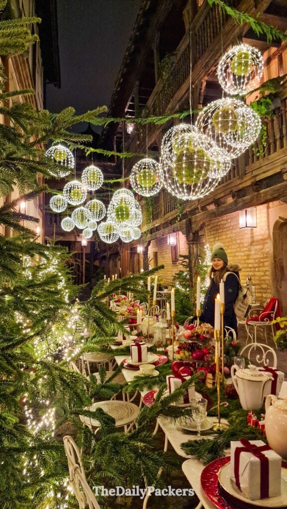 Festive courtyard decorated for Christmas in Strasbourg old town at night