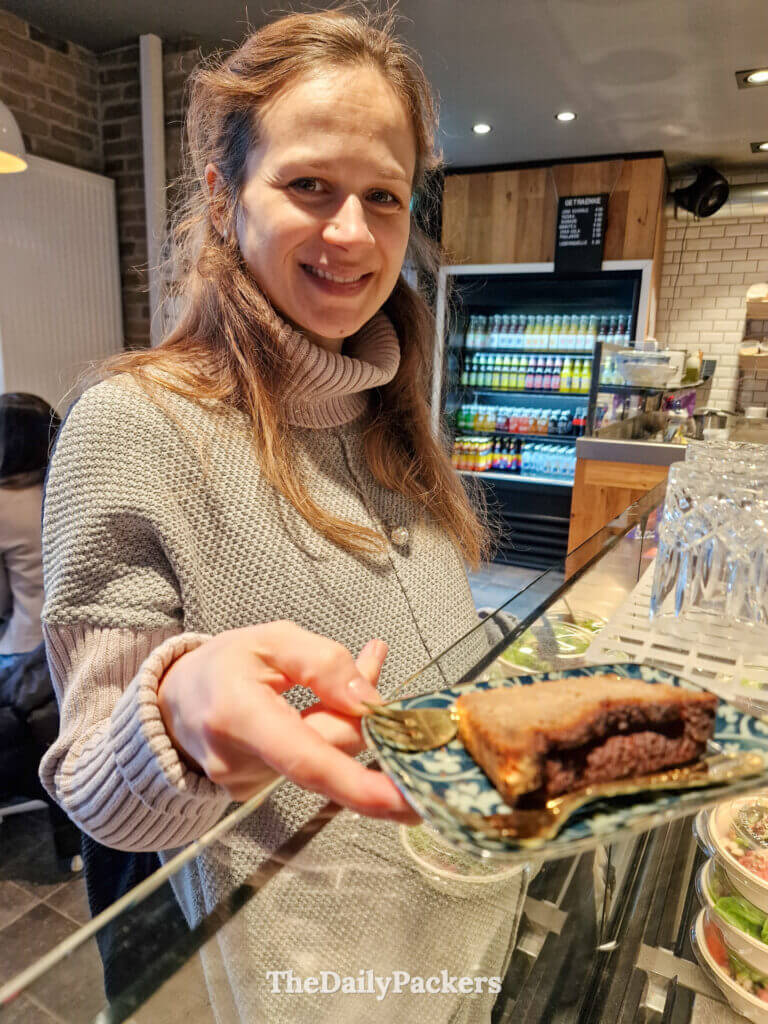 Getting homemade cake at Café Mamahe, a cozy café in Freiburg old town