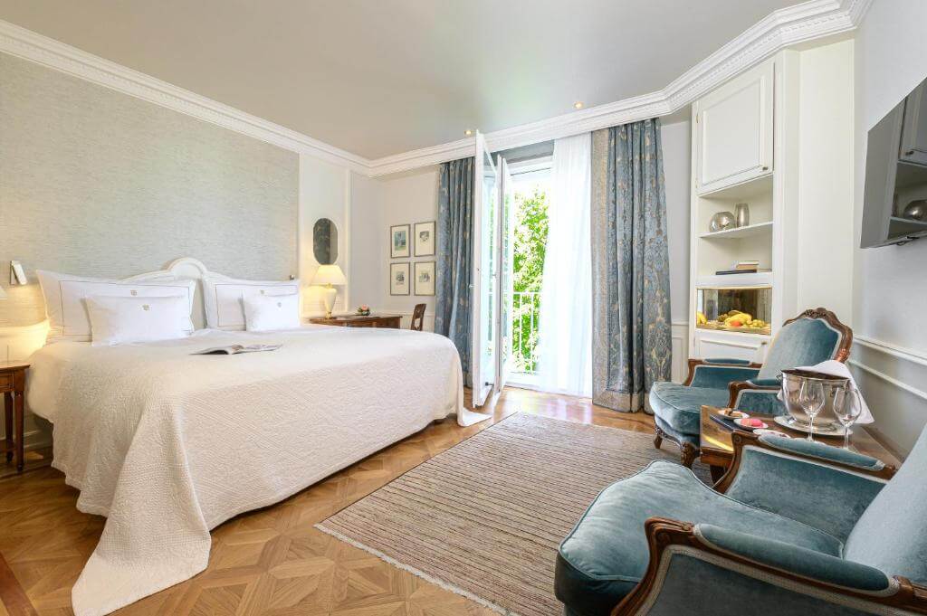 Luxury room at Colombi Hotel Freiburg with refined decor and seating area