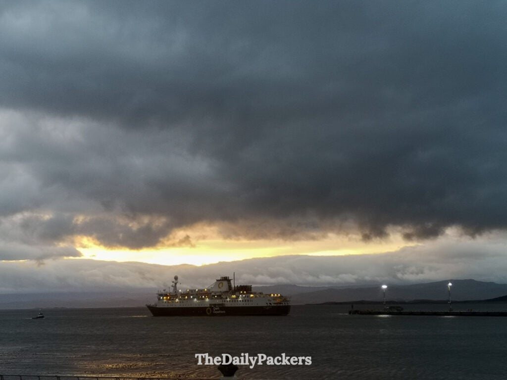 Expedition cruise ship in Beagle Channel at sunset, Ushuaia