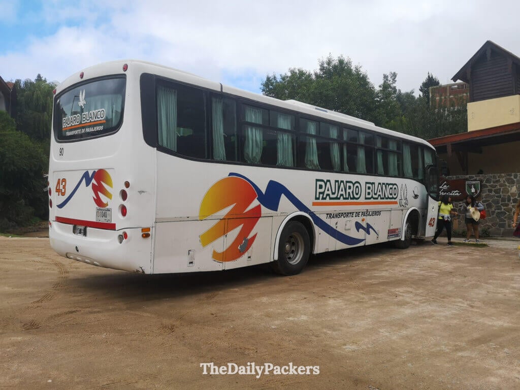 Pájaro Blanco bus parked at La Cumbrecita access point in the Córdoba mountains