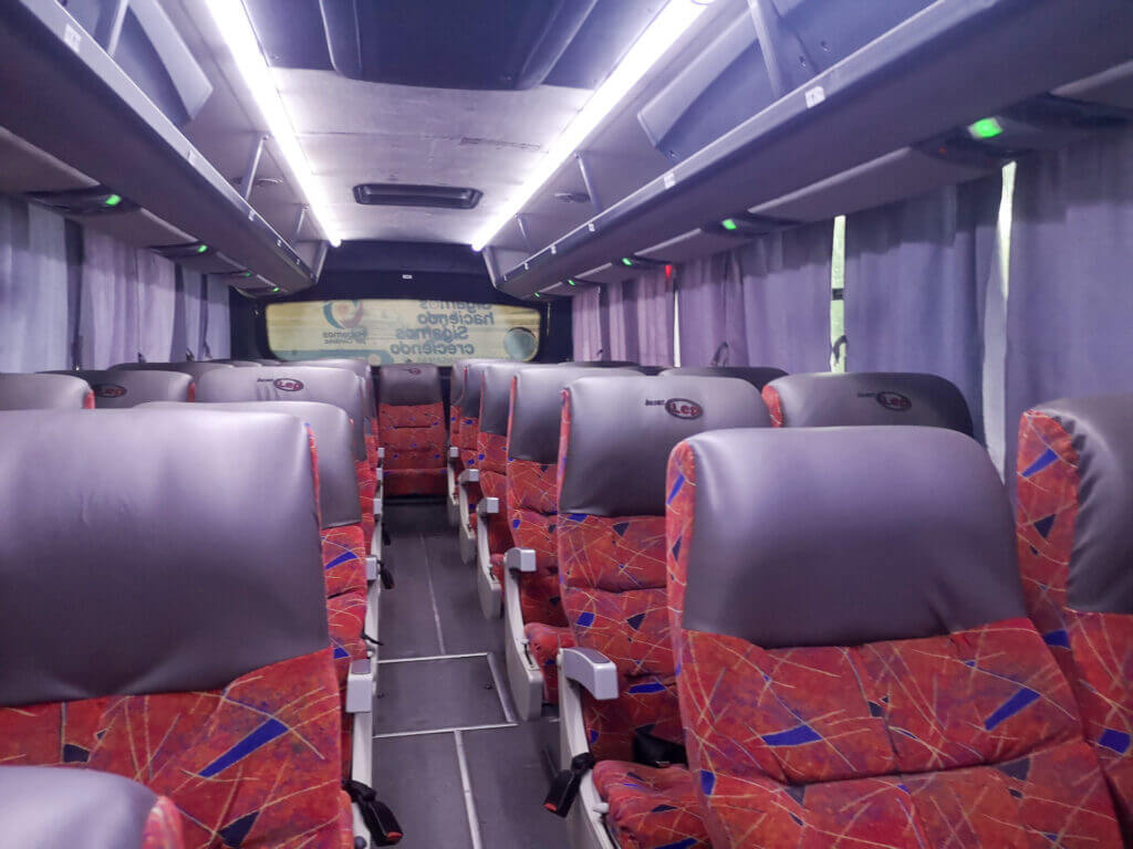 LEP bus interior with comfortable seats and overhead storage on long-distance route