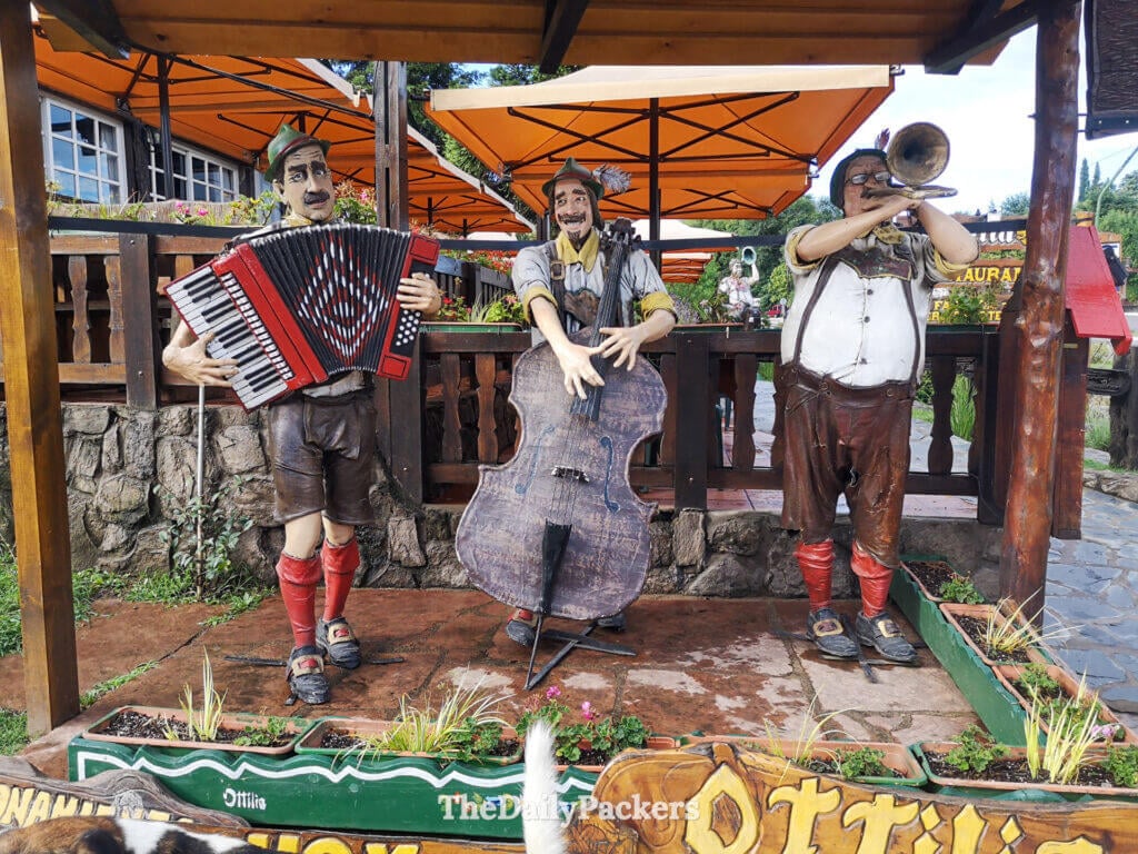 Traditional Bavarian-style musician statues in Villa General Belgrano, Argentina