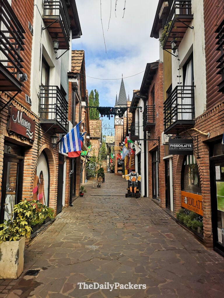 Pedestrian street in Villa General Belgrano lined with shops and German-inspired architecture