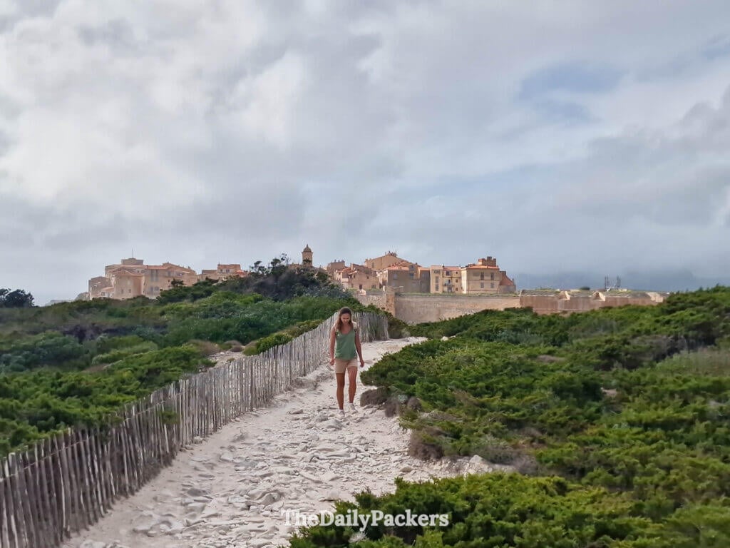 Scenic coastal trail at Campu Rumanilu with views of Bonifacio's clifftop buildings.