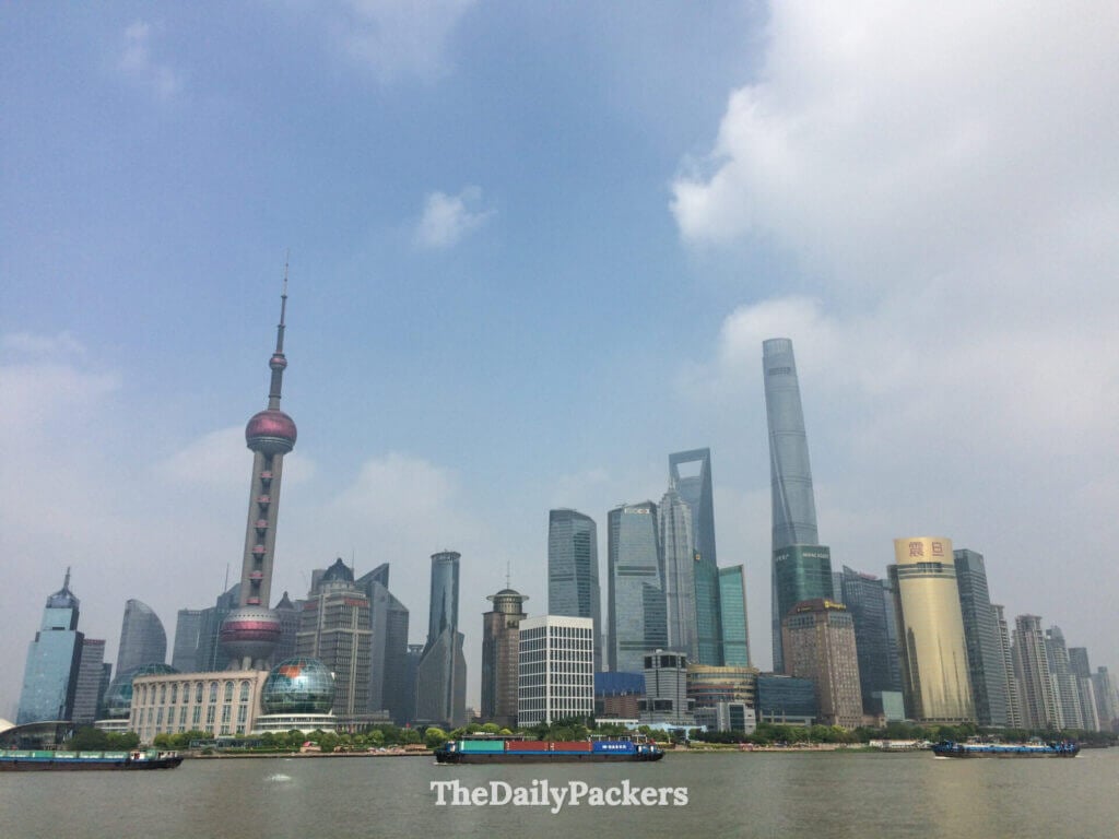 Pudong skyline with Oriental Pearl Tower and Shanghai Tower viewed from The Bund across Huangpu River