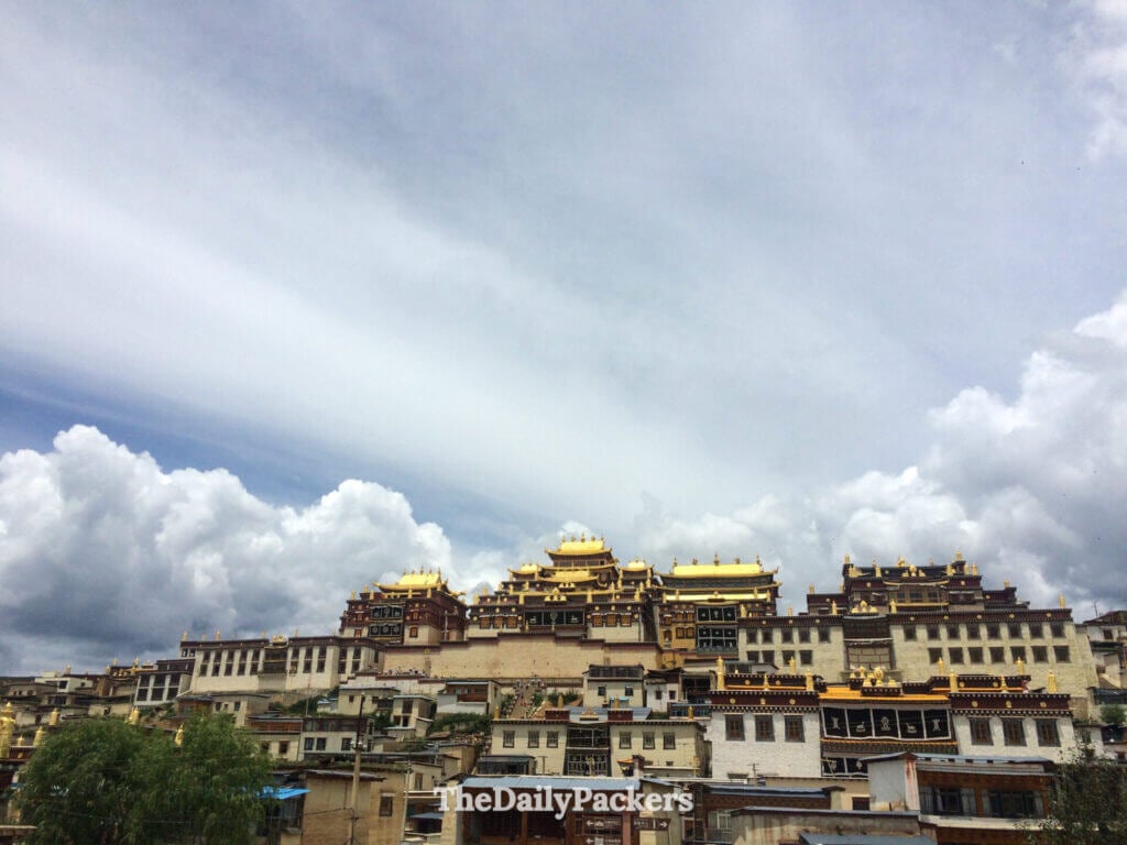 Golden rooftops of Songzanlin Monastery crown the hillside in Shangri-La, Yunnan.